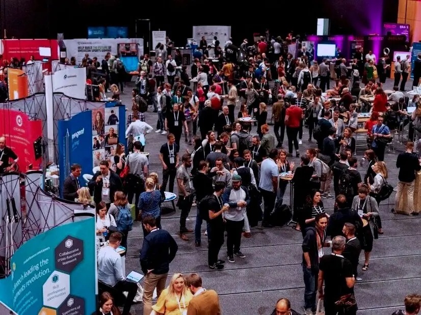 Attendees networking among exhibitor stands at Turing Fest 2019