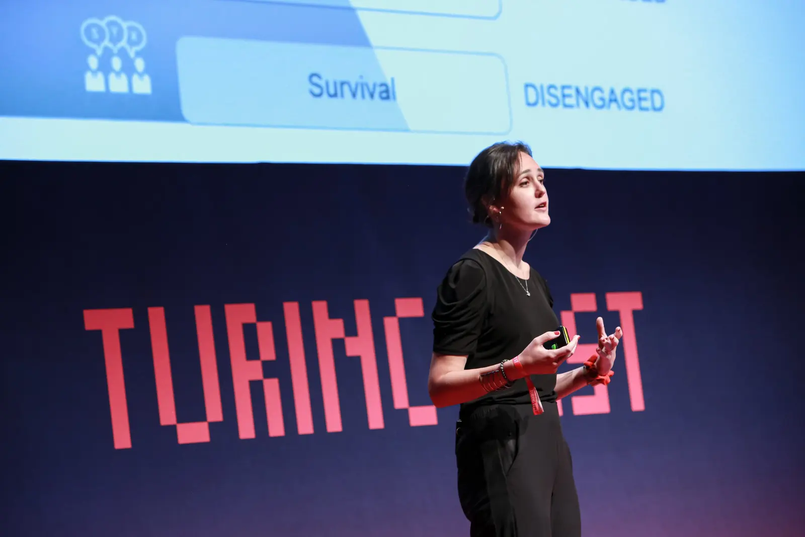 Sara Archer of ChartMogul speaking on stage at Turing Fest 2021